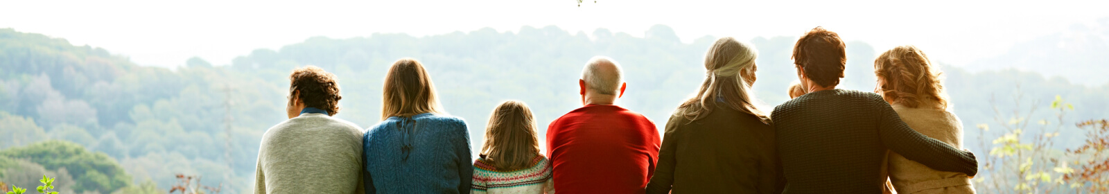 a family sitting outside