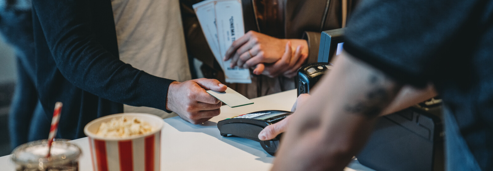 people buying movie concessions